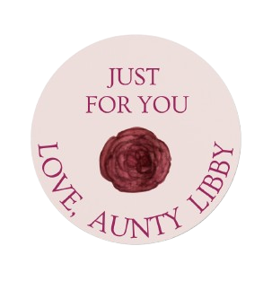 Round pink Logo with burgundy camellia in centre, words: Just For You Love, Aunty Libby